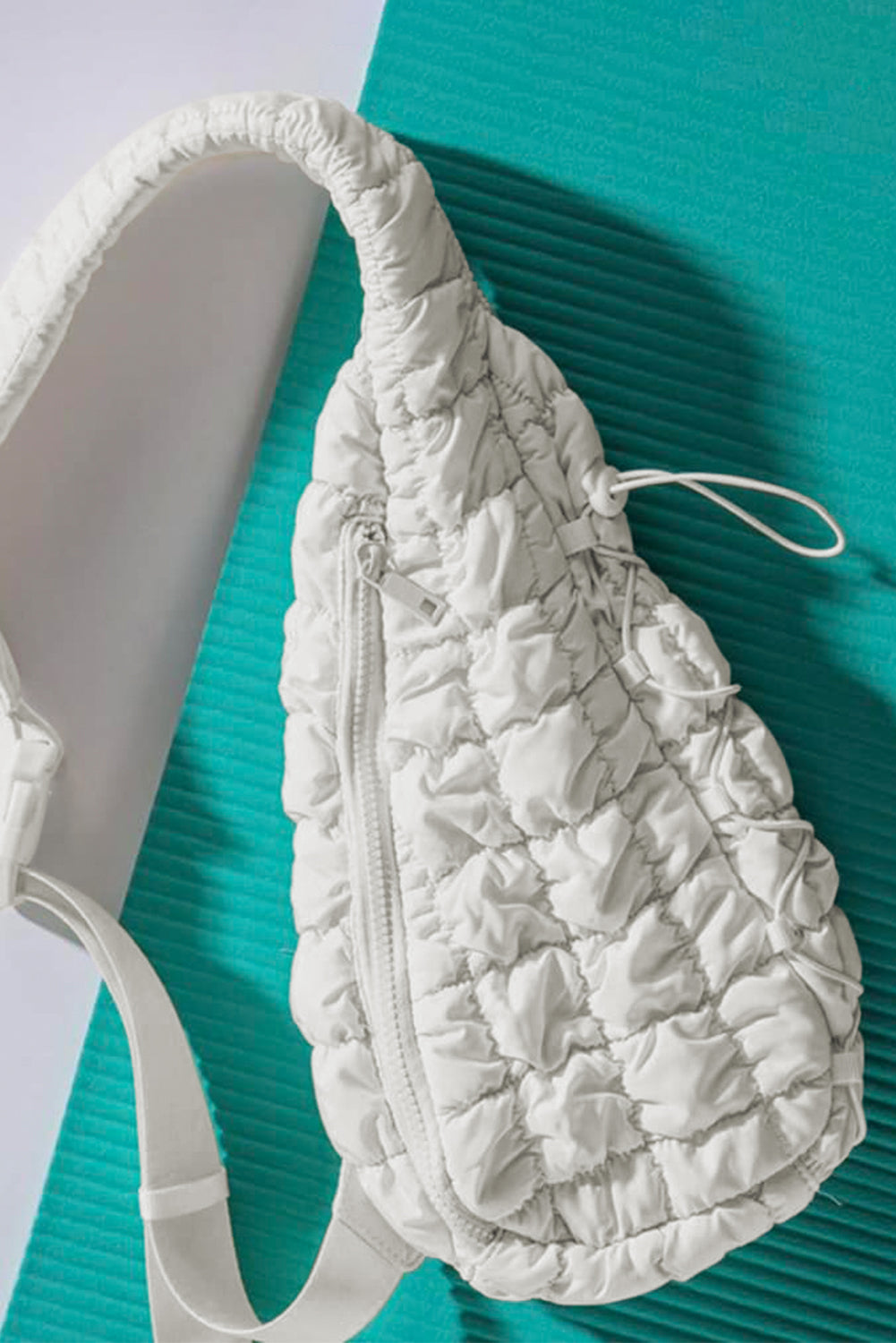 Wisteria Marshmallow Quilted Drawstring Crossbody Bag